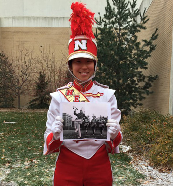 Becca Wolf with her grandfather's photo