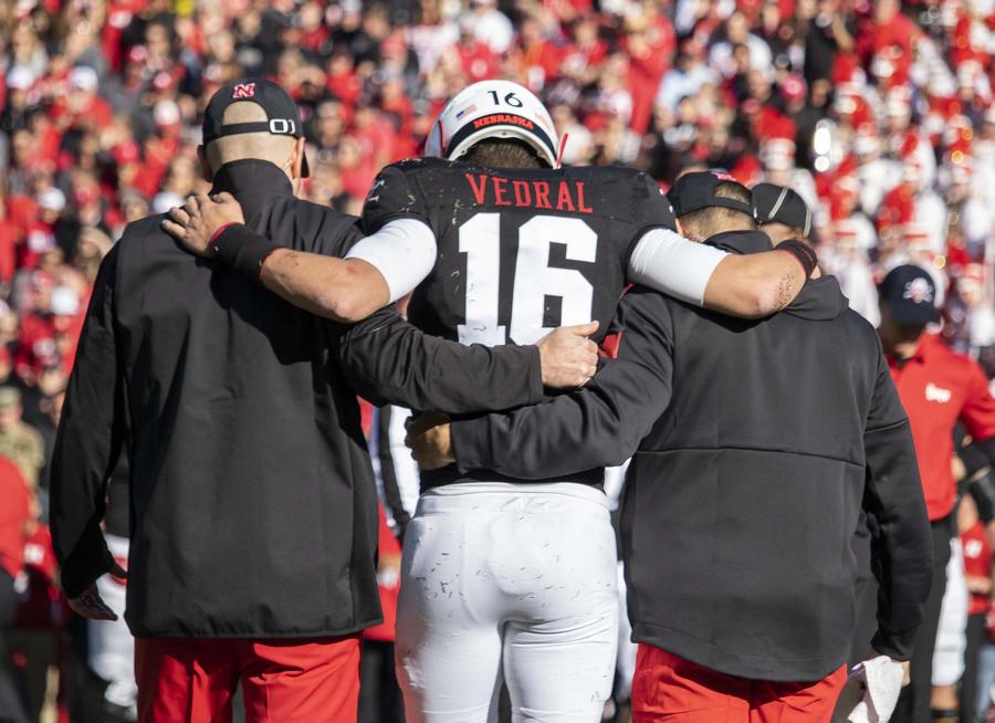 Noah Vedral is helped off the field